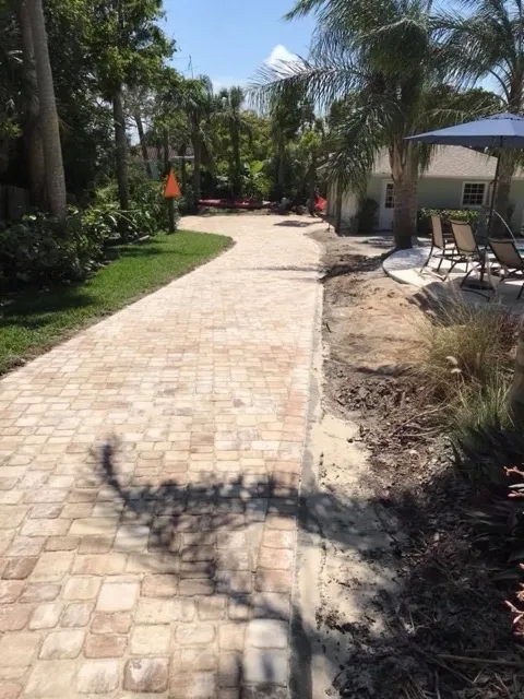 Beautifully paved brick pathway by BMW Services.